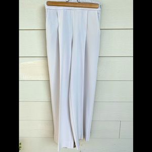 High-waisted pleated pants from Babaton Aritzia size 2 in escape/denude color